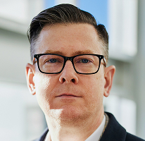Alexander Hughes, CEO e executivo de uma empresa de negociação de criptomoedas, em retrato